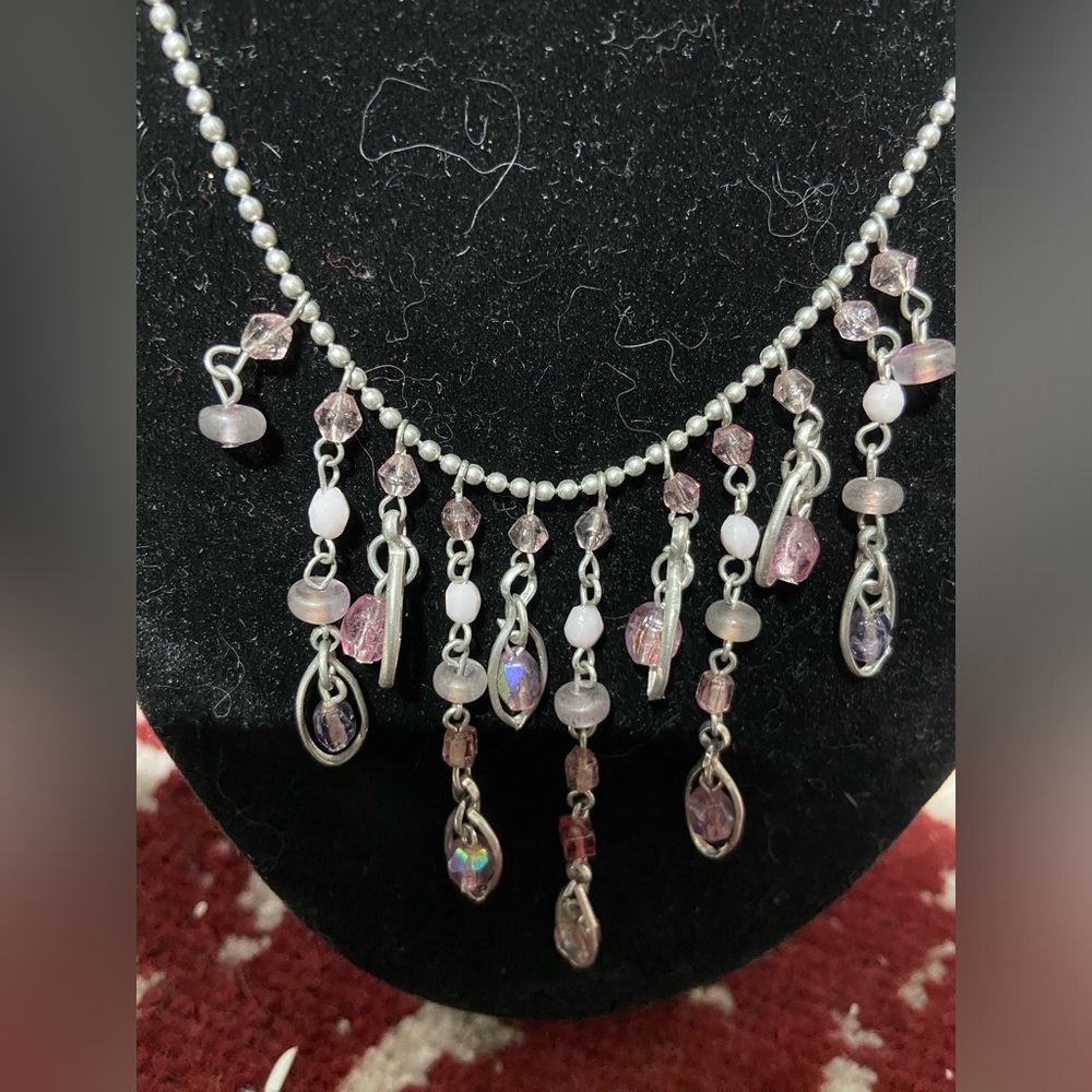 Silver Tone Multi-Pendant Necklace.  Pendants Grow in Size to the Center.V Shape